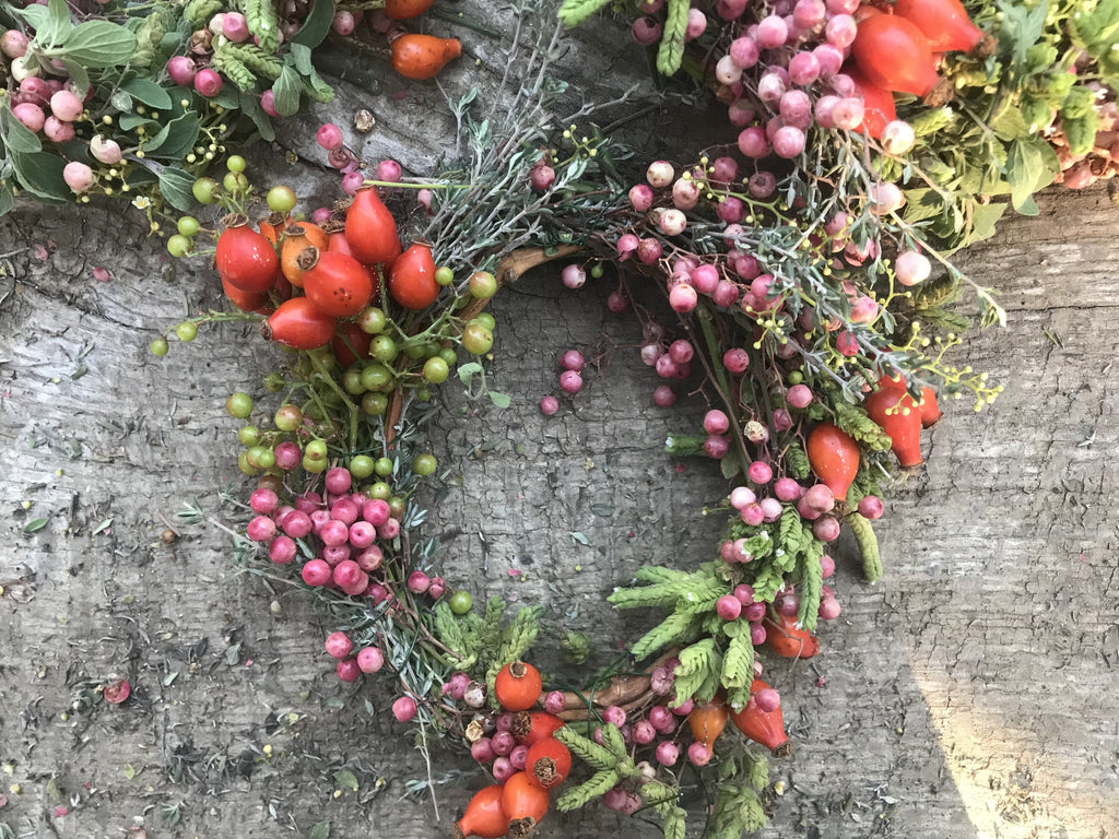 A perfect wreath for any home, and especially for the kitchen. Each wreath is made from faerie things:  California pepperberries, rose hips, oregano, and thyme. All wreath armatures are made of on site willow or pepper. As each wreath is handmade, they will vary in size between 9